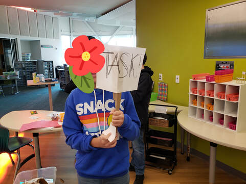 Student participating in a TASK party in a makerspace classroom.